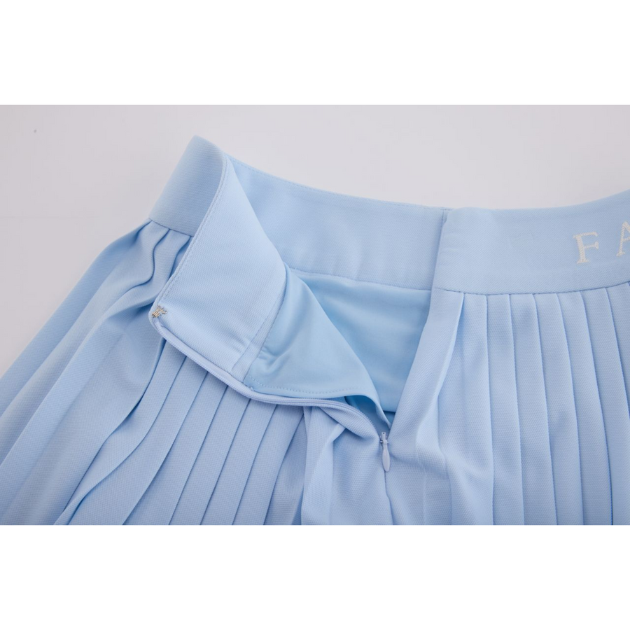 PERFORMANCE PLEATED SKIRT