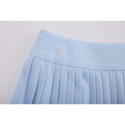 PERFORMANCE PLEATED SKIRT