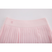 PERFORMANCE PLEATED SKIRT