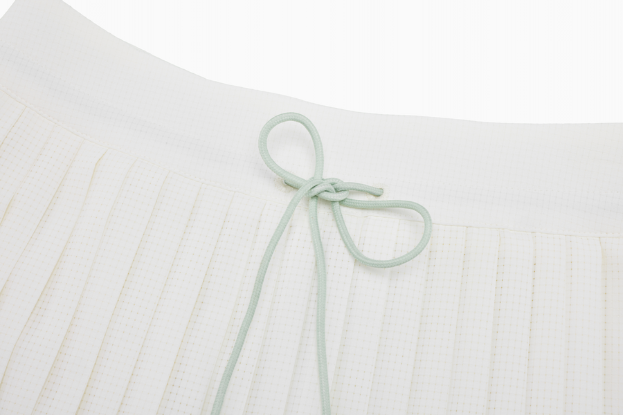 MAGIC LIP STRING PLEATED SKIRT