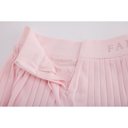 PERFORMANCE PLEATED SKIRT