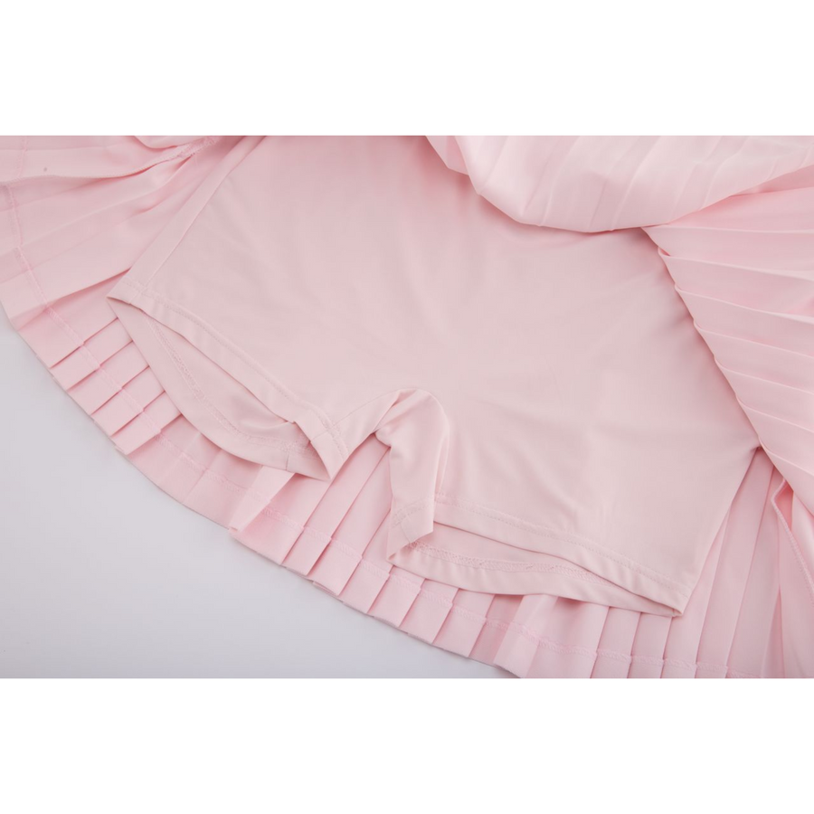 PERFORMANCE PLEATED SKIRT