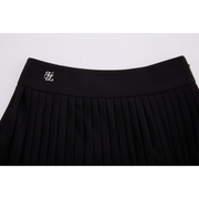 PERFORMANCE PLEATED SKIRT