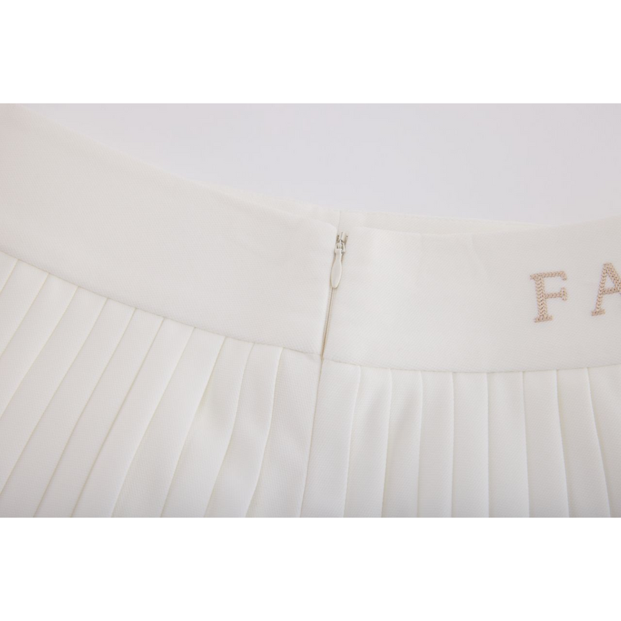 PERFORMANCE PLEATED SKIRT