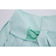WIDE PERFORMANCE PLEATED SKIRT