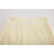 PERFORMANCE PLEATED SKIRT