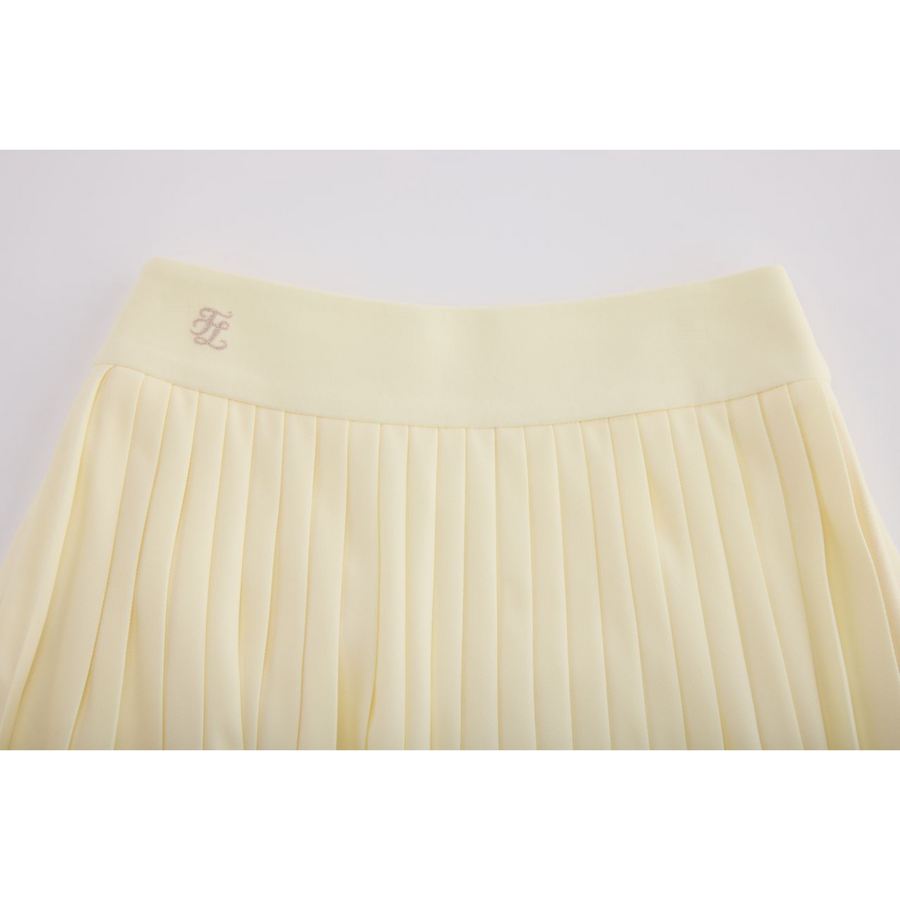 PERFORMANCE PLEATED SKIRT