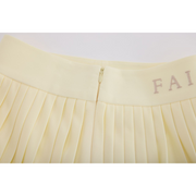 PERFORMANCE PLEATED SKIRT