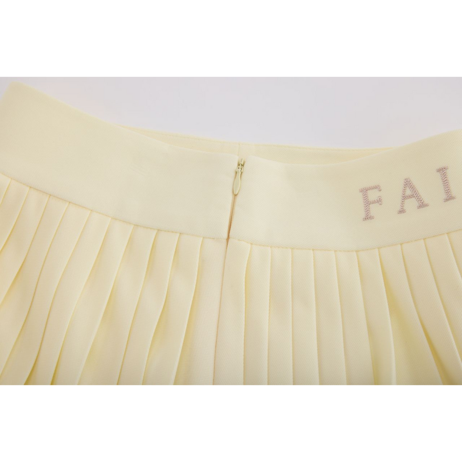 PERFORMANCE PLEATED SKIRT