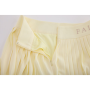 PERFORMANCE PLEATED SKIRT