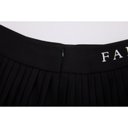 PERFORMANCE PLEATED SKIRT