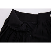 PERFORMANCE PLEATED SKIRT