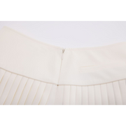 SILK TWIST FLARE PLEATS SKIRT