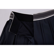 DOUBLE PLEATED BAND SKIRT