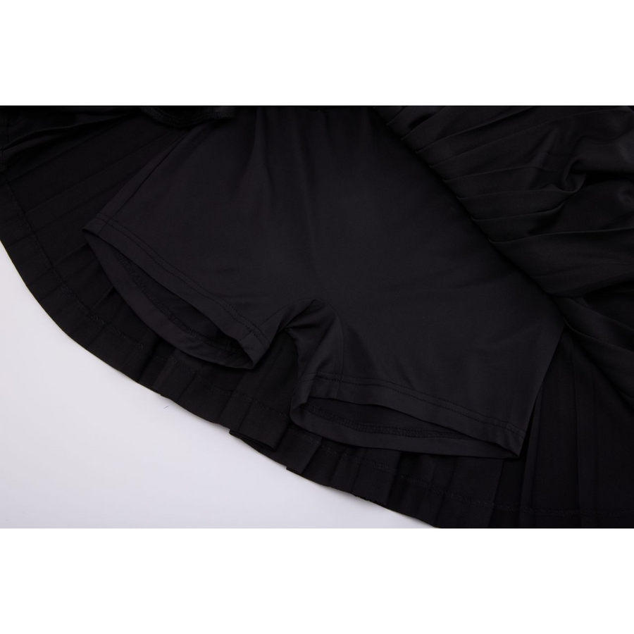 PERFORMANCE PLEATED SKIRT