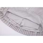 SILK TWIST FLARE PLEATS SKIRT