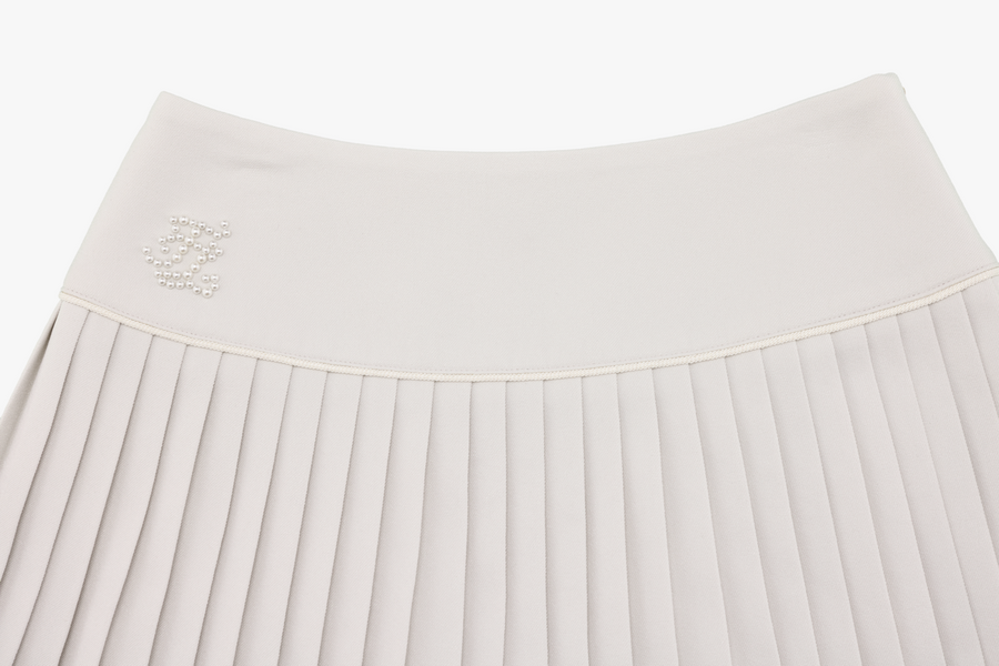 PEARL LOGO FLARED PLEATS SKIRT