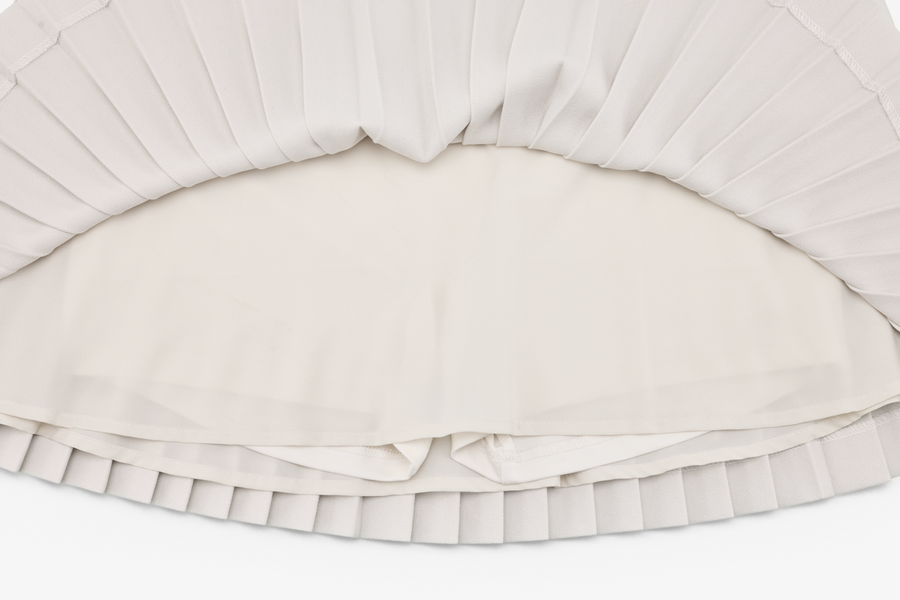 PEARL LOGO FLARED PLEATS SKIRT