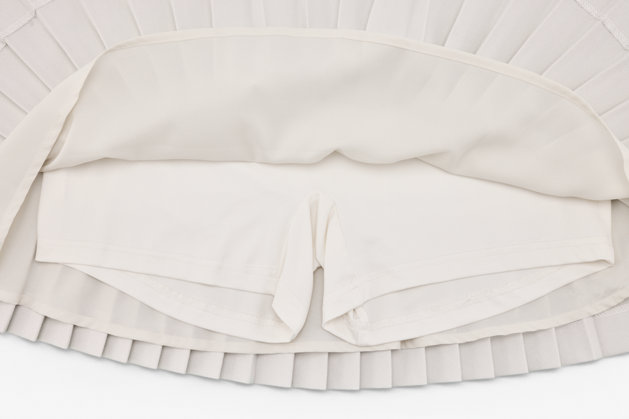 PEARL LOGO FLARED PLEATS SKIRT