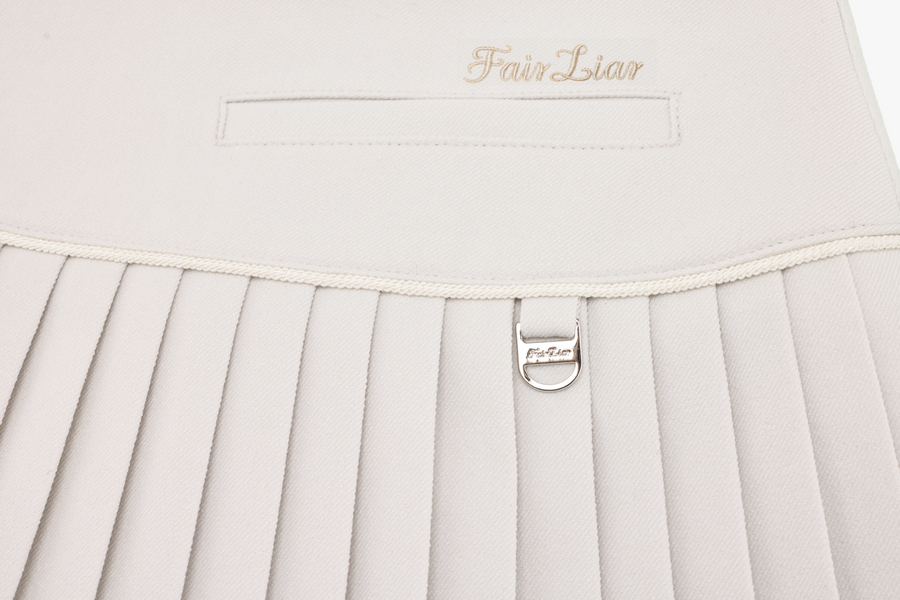PEARL LOGO FLARED PLEATS SKIRT